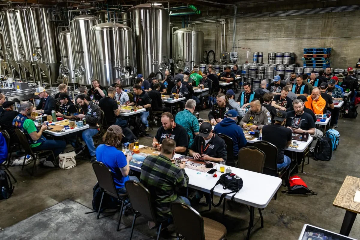 A packed beer garden under the grain silo
